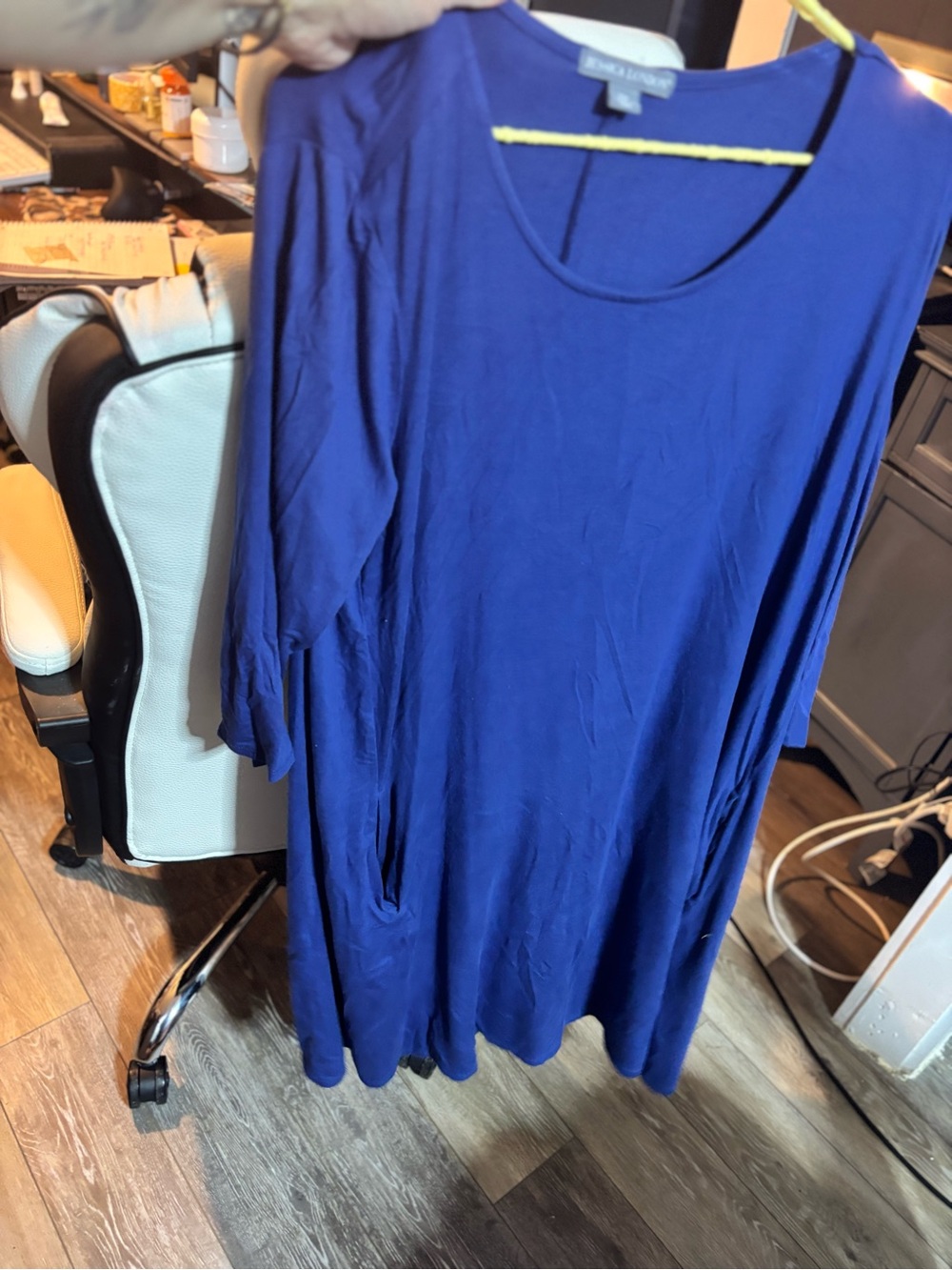 Blue Jessica London dress with sleeves and pockets.